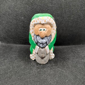 Santa Claus green whit seeds of cards