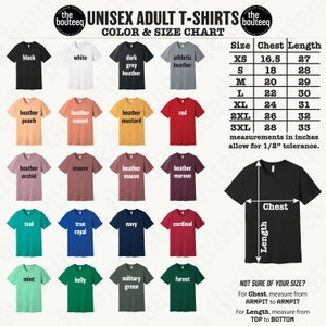 以下が含まれることがあります： ユニセックス大人用Tシャツの色とサイズチャート。黒、白、赤など様々な色が表示され、サイズはXSから3XLまで。胸囲と着丈の寸法がインチで表示されています。