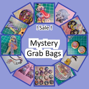 May include: A collage of images featuring various colorful and illustrated pins, buttons, and charms. The images are arranged in a circle around the text "! Sale ! Mystery Grab Bags".