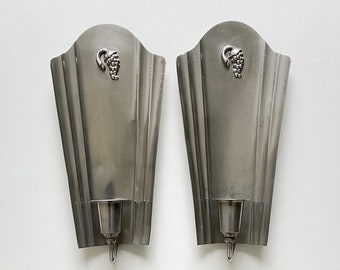 C.G.HALLBERG - A pair of Antique Art Deco "Swedish Grace" pewter wall candle sconces with beautiful decoration.