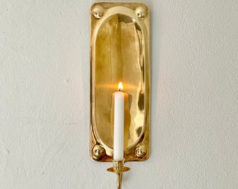 Large Antique Scandinavian wall candle sconce in solid brass.