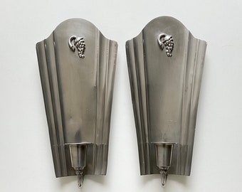 C.G.HALLBERG - A pair of Antique Art Deco "Swedish Grace" pewter wall candle sconces with beautiful decoration.