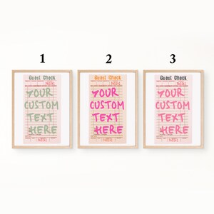May include: Three framed prints of guest checks in light wood frames, numbered 1, 2, and 3. Each print features a pink background with grid lines and the text 'Guest Check' at the top, with 'YOUR CUSTOM TEXT HERE' in green, orange, or black.