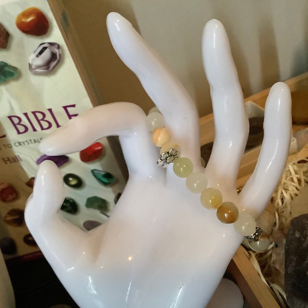 8mm Yellow Afghanistan Jade|Bowenite|Crystal Beaded Bracelet with Silver Alloy Flower Charm and spacers. Healing,Uplifting,and Protective
