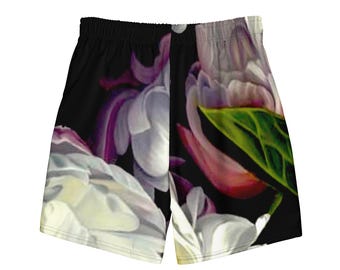 Bañador corto con estampado floral exagerado en material reciclado.