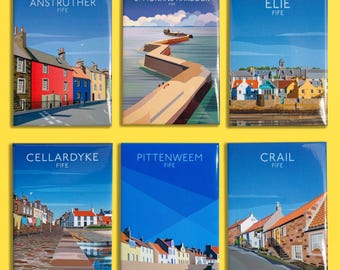 May include: A set of six rectangular magnets featuring illustrated coastal scenes from Fife, Scotland. The designs depict Anstruther, St Monans Harbour, Elie, Cellardyke, Pittenweem, and Crail, each labeled with its respective town name and Fife.