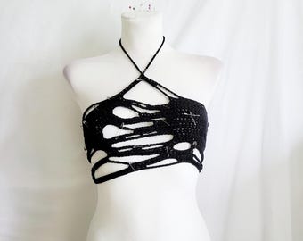 Top corto de crochet con efecto desgastado y espalda tipo corsé.
