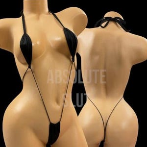 May include: Black thong bikini on a mannequin, front and back view. The bikini features a halter top and a thong bottom, with thin straps. The mannequin is a light skin tone, set against a black background.