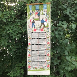 Calendar /almanac in fabric from the year 1981 with a printed Swedish motif.