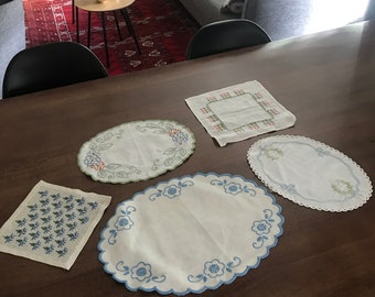 5 small hand-embroidered tablecloths from Sweden