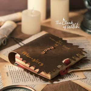 May include: A brown leather-bound book titled "The Monster Book of Monsters" with a unique saw-tooth edge design. The book is open with a red ribbon bookmark, surrounded by aged paper and candles.