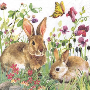 May include: Two brown rabbits in a field of green grass and colorful flowers. A yellow butterfly flies above the rabbits.