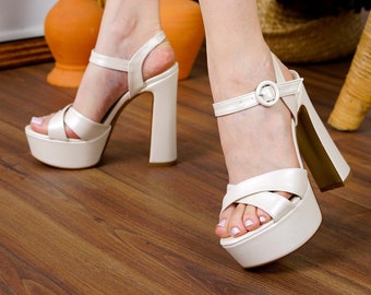 white platform heels size 4