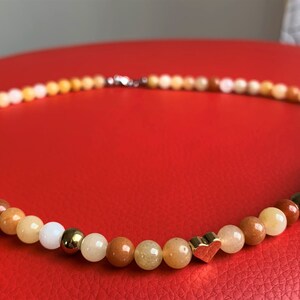genuine jade (topaz jade) in sunny shades, necklace made of 6 mm pearls with a delicate heart :-)