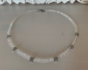 clear rock crystal - enchanting necklace made of beads 6 x 5 mm and silver flowers