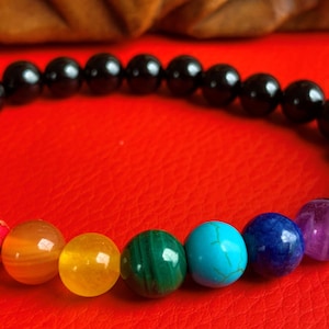 Chakra bracelet made of black obsidian beads 8 mm and 1 gemstone bead each for the 7 chakras