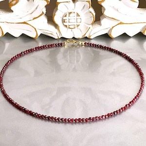 pure red garnet, necklace made of 3 mm faceted pearls; clasp selectable