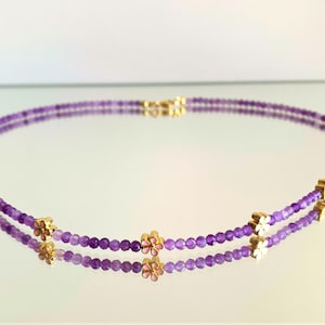 Amethyst quality AA as a delicate necklace made of 3 mm faceted pearls and 5 delicate pink flowers
