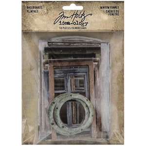 May include: A set of 10 distressed wood window frames and baseboards for crafting and scrapbooking. The frames are in various sizes and shapes, with a rustic, vintage look. Jim Holtz idea-ology.