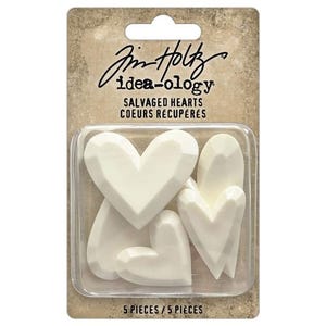 May include: Package of five white, wooden, heart-shaped embellishments. The package is labeled "Jim Holtz idea-ology Salvaged Hearts Coeurs Récupérés 5 Pieces / 5 Pieces".