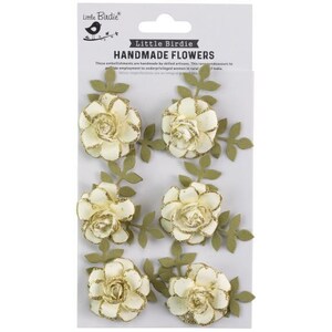 May include: A package of six handmade paper flowers with gold glitter accents and green leaves. The flowers are cream-colored with gold glitter centers. The package has the text "Little Birdie HANDMADE FLOWERS".