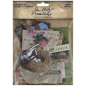 May include: A clear plastic package of ephemera with a variety of vintage-style paper elements. The pack includes tickets, receipts, and floral accents. The Jim Holtz idea-ology pack contains 102 pieces. The image includes the text "EPHEMERA PACK" and "MEMOIR".