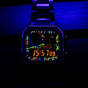 Hand-painted Casio AE-1200 Mod Neon Green and Orange Negative Display UV Effect - Casio Royale High-Quality Mods - Customized wrist watch