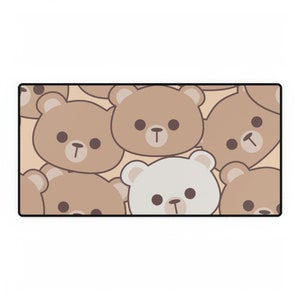 May include: A brown and white mouse mat with a repeating pattern of brown teddy bears with white faces. One white teddy bear is in the centre of the mouse mat.