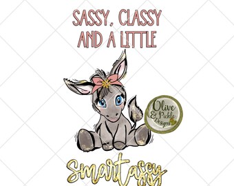 May include: A gray donkey with a pink bow in its hair sits on a white background. The text "Sassy, Classy and a Little Smartassy" is written in gold glitter letters below the donkey. The text "Olive & Pickle Designs" is written in a circle with a green background and white letters.