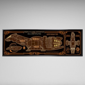 May include: A framed print featuring a detailed schematic of a Firefly-class transport ship. The design is rendered in shades of brown and gold against a black background, with the text "Firefly Class Transport" and "Like a leaf on the wind."