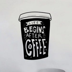 May include: Black and white wall decal of a coffee cup with the text "Life begins after coffee".