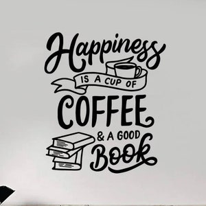 May include: Black and white text graphic that reads "Happiness is a cup of coffee & a good book". A stylized coffee cup and a stack of books are included in the graphic.