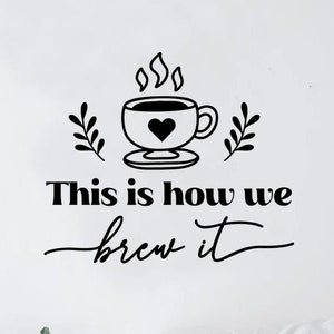 May include: Black and white wall decal with a coffee cup and the text "This is how we brew it".