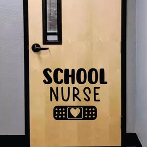 May include: A black and white door sign with the text "SCHOOL NURSE" and a bandage with a heart in the center.