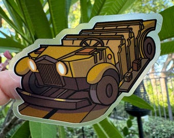 May include: A yellow cartoon car with a stack of brown bread loaves in the back. The car has a black bumper and headlights. The car is on a brown road.