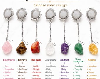 May include: Seven metal mesh tea infusers with chains and raw crystal pendants, including rose quartz, tiger eye, red agate, clear quartz, amethyst, green aventurine, and citrine. The text reads Crystal Tea Infusers and Choose your energy.