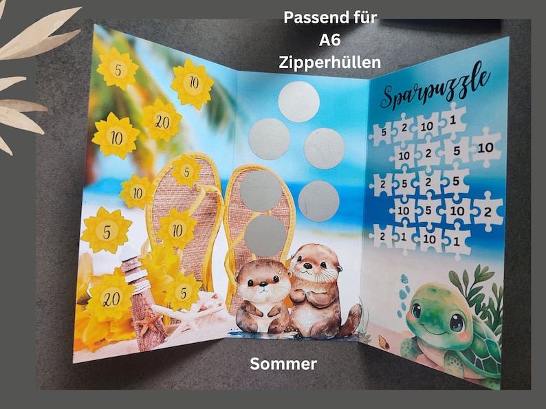 May include: A tri-fold savings tracker card featuring a beach theme with flip-flops, otters, and a turtle. The card includes yellow sunflower icons with numbers, silver scratch-off circles, and a puzzle grid labelled Sparpuzzle.
