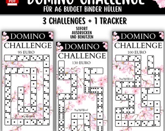 May include: Three printable domino challenge game boards with a pink floral background. The boards are designed for A6 budget binder covers. The games are priced at 95, 100, and 130 Euros.