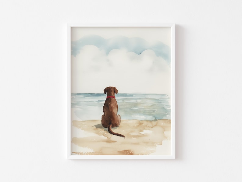 May include: Watercolor painting of a brown dog sitting on a beach, looking out at the ocean. The sky is blue with white clouds.