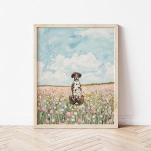 May include: A watercolor painting of a brown and white dog sitting in a field of pink and white flowers. The dog is looking away from the viewer, and the sky is blue with white clouds.