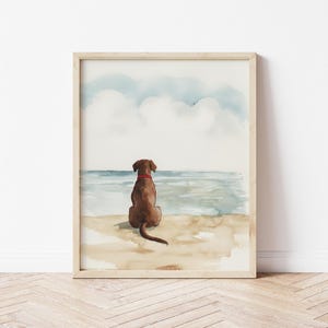 May include: Watercolor painting of a brown dog sitting on a beach, looking out at the ocean. The sky is blue with white clouds.