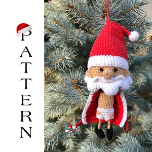 May include: Crocheted Santa Claus ornament with a red hat, white beard, and brown body. He is wearing red and white underwear and a red cape. The ornament is hanging on a green pine tree.