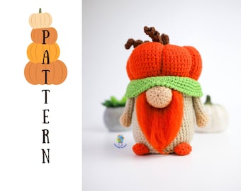 May include: A crocheted pumpkin gnome with a green hat and orange beard. The gnome is sitting on a white surface. The word "PATTERN" is written vertically in brown letters on the left side of the image.