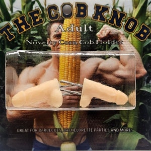 May include: Novelty corn cob holders, labeled "The Cob Knob Adult." The holders are flesh-toned and shaped like a phallus. The packaging includes text that reads "Great for barbecues, bachelorette parties, and more."