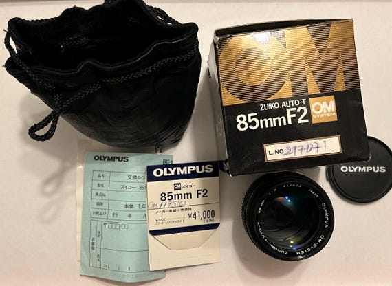 OLYMPUS OM-System zuiko auto-T 85 mm f2 Objektiv Look Unbenutzt 