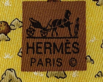 HERMES TIE 7763 FA Yellow  Black “Groundhogs” 100% Silk tie new without tags