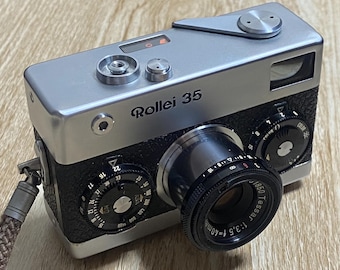 Rollei 35 cromado modelo alemán antiguo abolladura pero buen usuario