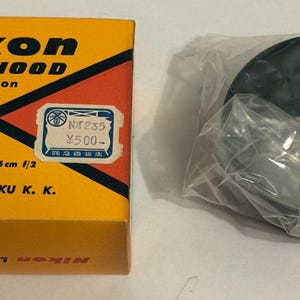 Rare and early Nikon Rangefinder Nikkor 5cm f2  Lens Hood brand new in box