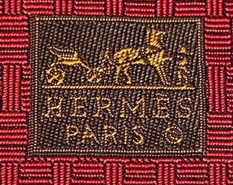 Hermes stropdas 428765 T Rood Zwaar geweven 100% zijde nieuw zonder labels