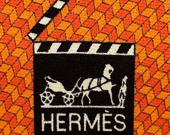 HERMES 645731 IA Oranje zijden stropdas met “Clapper Board”-motief Nieuw zonder kaartjes